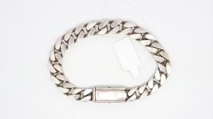 GUCCI- A silver Gucci curb link bracelet, clasp signed Gucci, length approximately 19cm