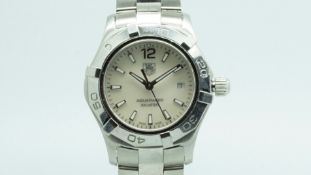 Ladies' Tag Heuer Aquaracer, cream circular dial, baton hour markers, stainless steel case and