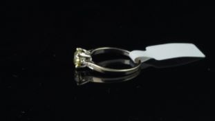 Single stone diamond ring, natural fancy yellow transitional cut diamond, weighing 1.11ct, claw