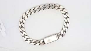 GUCCI- A silver Gucci curb link bracelet, clasp signed Gucci, length approximately 20cm