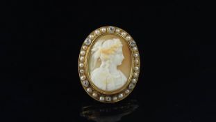 Pearl and diamond cameo brooch, central shell cameo of a lady, surrounded by half pearls and old cut