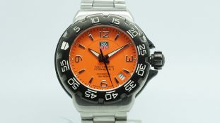 Gentlemen's Tag Heuer Formula 1, circular orange dial black outer bezel, stainless steel case and