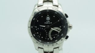 Gentlemen's Tag Heuer Link Cal. S, circular black dial, twin register, stainless steel case and