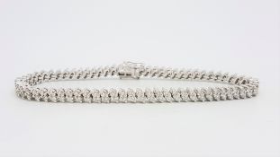 Diamond tennis bracelet, two rows of round brilliant cut diamonds, weighing an estimated 2.40ct, set