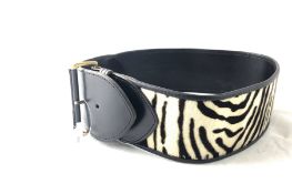 OSPREY- An Osprey leather zebra print belt, approximately 80cm long, 8cm wide, signed Osprey,