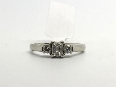 Diamond twist ring, wedding band style ring with twist detail to the centre and a rubover set