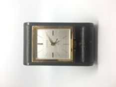 Vintage Jaeger LeCoultre '8 Day' Alarm Clock, square linen dial gold baton hour markers.