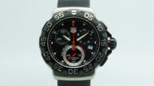 Gentlemen's Tag Heuer Formula 1, circular black 3 register dial, stainless steel case, black leather