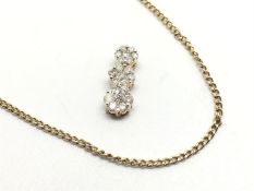 Diamond cluster pendant, three graduated diamond clusters, together with a SGL certificated