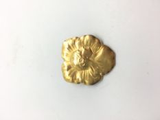 Art Nouveau pendant brooch, female figure with floral head piece, upon petals, stamped and tested as