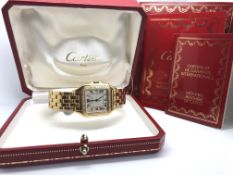 18ct Cartier Panthere, diamond set bezel, 18ct case and bracelet, with original box and paperwork
