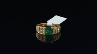 Emerald and diamond ring, central square step cut emerald with graduating rows of round brilliant