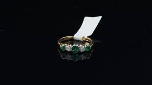 Five stone emerald and diamond ring, alternating emeralds and round brilliant cut diamonds, in