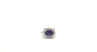 Purple sapphire and diamond cluster ring, central oval purple sapphire, estimated weight 3.99ct,