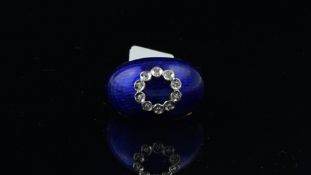 Enamel and diamond bombÃ© style ring, blue guilloche enamel set with a circle of single cut diamonds