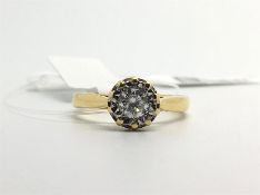 Single stone diamond ring, round brilliant cut diamond weighing an estimated 0.33ct, illusion set in