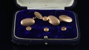 9ct rose gold dress set, comprising a pair of oval cufflinks, hallmarked 9ct, Birmingham, 1864,