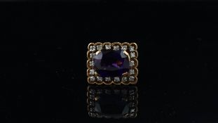 Vintage amethyst and diamond ring, central cushion cut amethyst, surrounded by single cut