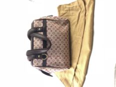 LOUIS VUITTON- A rare and unusual Cherry mini Josephine monogram bag. Gold metallic zip closure