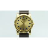 Ladies' Piaget 18ct Gold Wristwatch, circular champagne dial with blue enamel markers, outer black