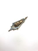 Edwardian blue enamel pendant, briolette shaped centre piece with crown detail, pivots within a blue