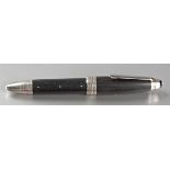 A Cased Silver-Mounted And Ebony Montblanc Rollerball Pen the wooden body applied with silver