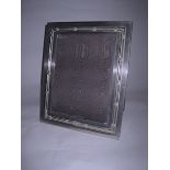 An Italian Electroplate-Mounted Easel Back Picture Frame, Gucci the rectangular body with a reed-