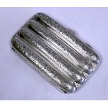 An Edwardian Silver Cigar Case, Smith & Bartlam, Birmingham, 1909 the rectangular body fitting four