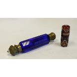 A Metal-Mounted Blue-Glass Double Ended Perfume Bottle each cover with scrolling foliage,