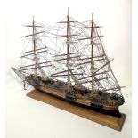 A Painted and Metal-mounted Model of A Four Masted Ship,