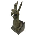 After The Antique: A Greek Patinated Bronze Figure of A Griffin Head,