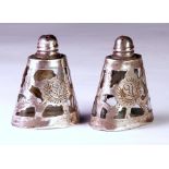 A Pair Of Continental Silver-Mounted Clear Glass Salt And Pepper Shakers