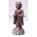 A Chinese Lacquered Bronze Figure of a Monk, Ming Dynasty (1368-1644)
