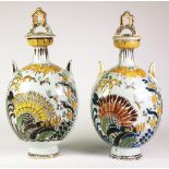 A Pair of Delft Polychrome Moon Flasks and Covers, 19th Century