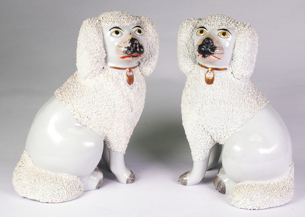 A Pair of Staffordshire Figures of King Charles Spaniels, 19th Century