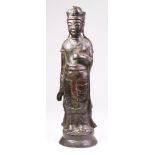 A Chinese Patinated Bronze Figure Of Guanyin, Ming Dynasty (1368-1644)