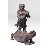 A Chinese Patinated Bronze Figure of Liu Hai And Three-Legged Toad, 18th/19th Century