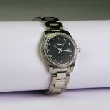 A Stainless Steel Conquest Longines Watch