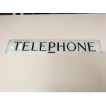 Telephone box sign