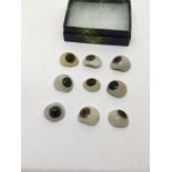 Collection of 9 prosthetic glass eyes