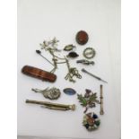 Collection of miscellaneous jewellery pencils brooches etc