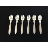 Six silver georg Jensen tea spoons cactus design