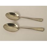 Pair of large Dutch silver serving spoons