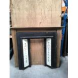 Cast Iron Fireplace with Wood Surround