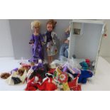 Selection of vintage dolls and dolls clothes accessories