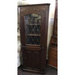 Oak Corner Cabinet, Leaded Top, Linenfold Door Bottom