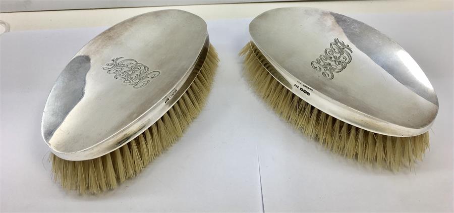Pair of Large Walker & Hall Clothes Brushes Each Measure approx 14cm by 7.3cm full Sheffeild Silver