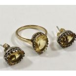 Gold gem set ring and earrings ring