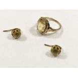 Gold gem set ring and earrings