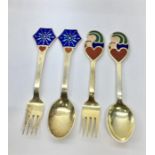 2 Pair Of Silver & Enamel Denmark Year Spoons And Forks by A.Michelsen 1968 & 1976